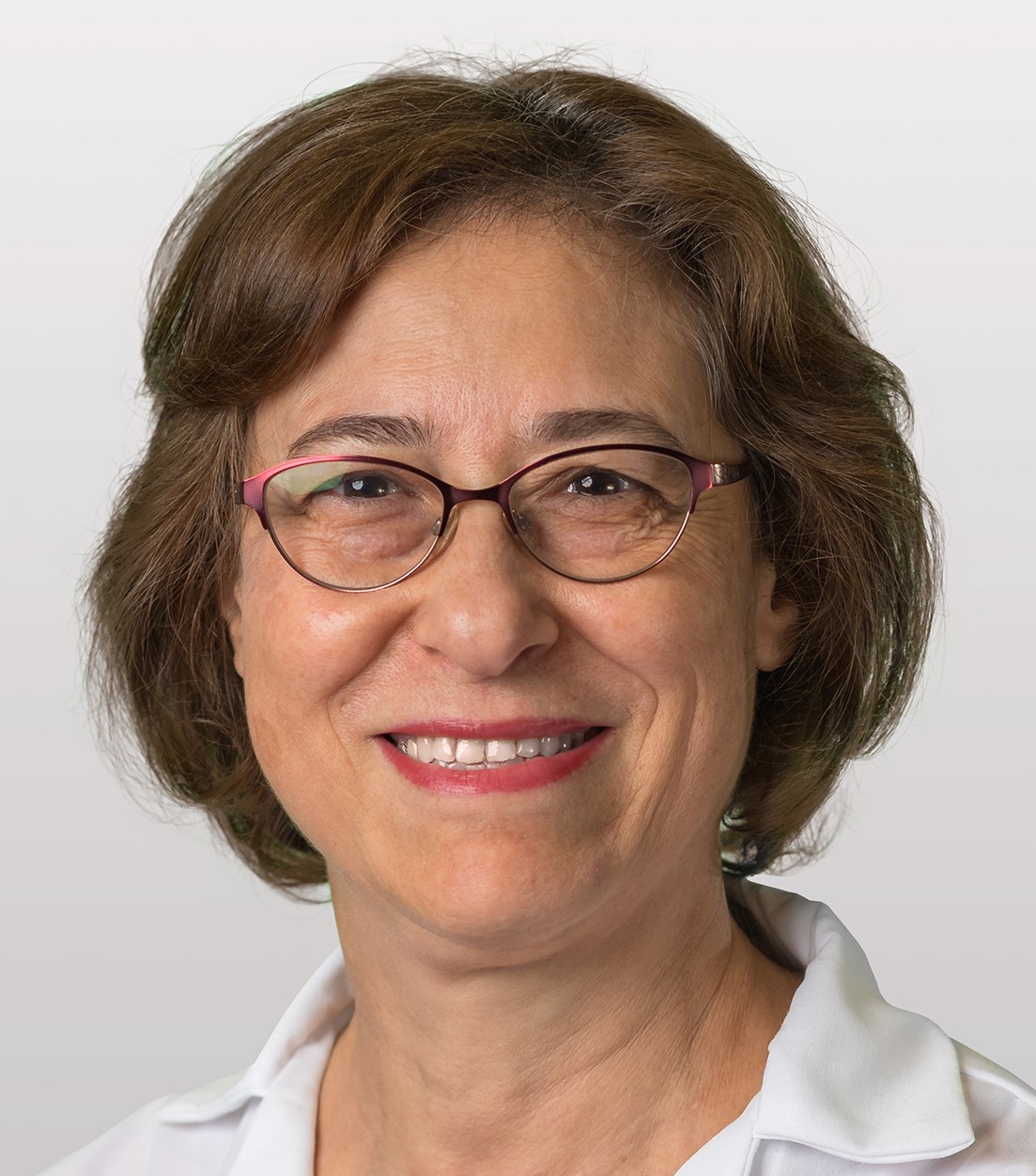 Dr. Rima Menassa